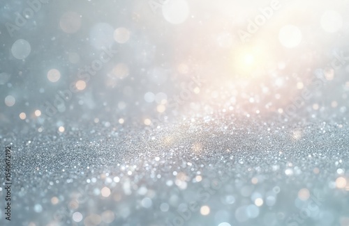 Glittering silver glitter background. Sparkly, shiny, shimmery texture. Bokeh effect. Luxury design. White background. Perfect for celebrations holidays Christmas New Year birthday and more.