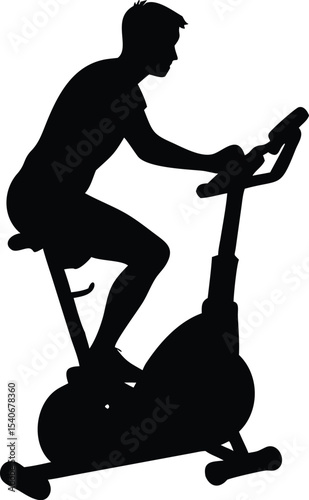 Silhouette of person on stationary exercise bike