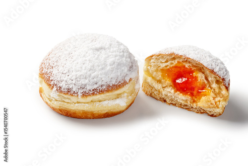 Delicious jelly doughnuts with icing sugar on white background