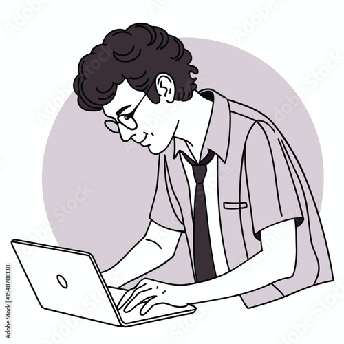 Young man wearing glasses works on a laptop with focus and dedication