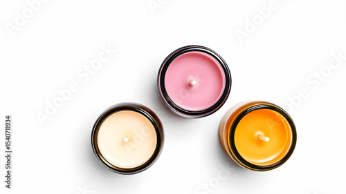 Set of three pastel-colored candles in clear jars with wooden lids, arranged in a triangle shape, white background, clean overhead view