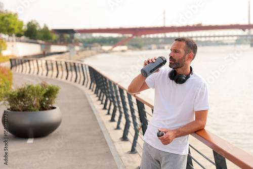 Man enjoying water break wh...