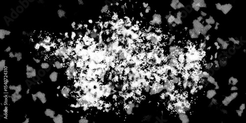 Snowflakes on dark background. white icy snowflakes isolated on black background, natural background. white crystalline powder on a black background. sugar dust. texture, pattern and clipping.