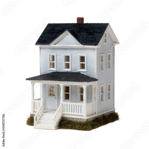 A detailed model of a classic white house with a porch, showcasing craftsmanship and design elements, ideal for architectural displays or educational purposes.
