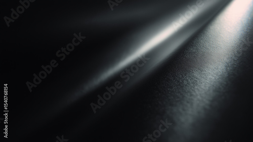 Light beam reflecting on dark textured surface