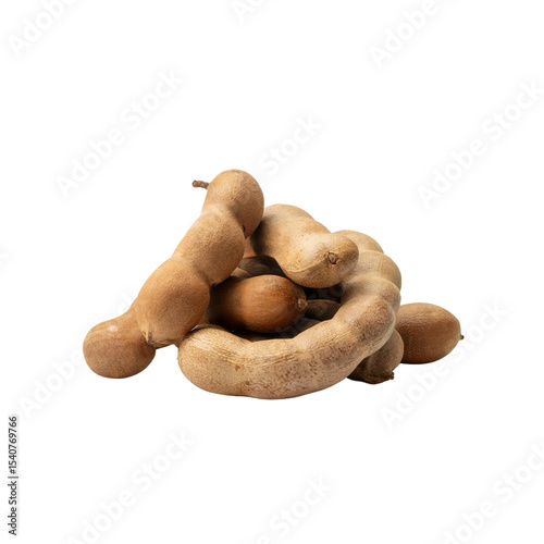 Tamarind pods isolated on white, dried tamarind fruit stack, tropical brown tamarind close-up