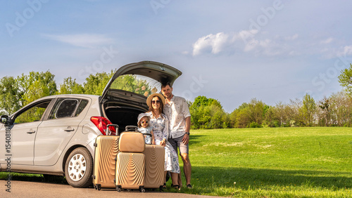 Family in car. Man woman child traveling. Summer adventure road smile.