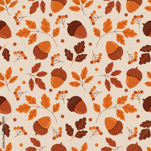 Autumn seamless pattern with leaves, acorns and berries. Perfect for fall themed backgrounds, textile designs or wrapping paper. Vector Illustration.