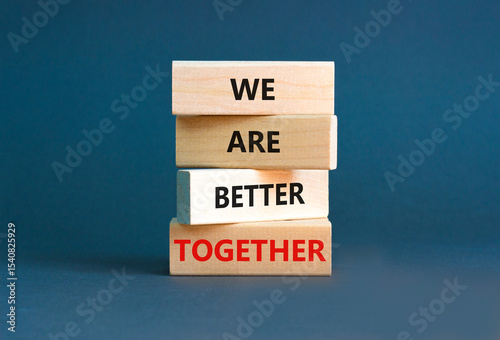 We are better together symbol. Concept words phrase We are better together on beautiful wooden blocks. Beautiful grey paper background. Business We are better together concept. Copy space.