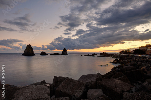 Cyclops stacks in Aci Trezza at sunrise, Sicily, Italy