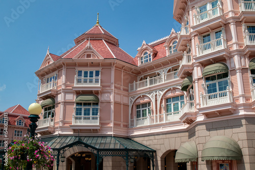 Pink Building Facade with Balconies and Awnings  at Disneyland Paris.