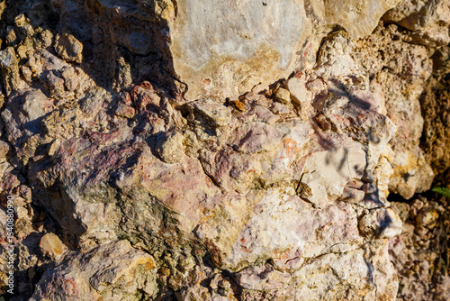 Surface of dense fine-grained limestone, geological outcrop of sedimentary rock