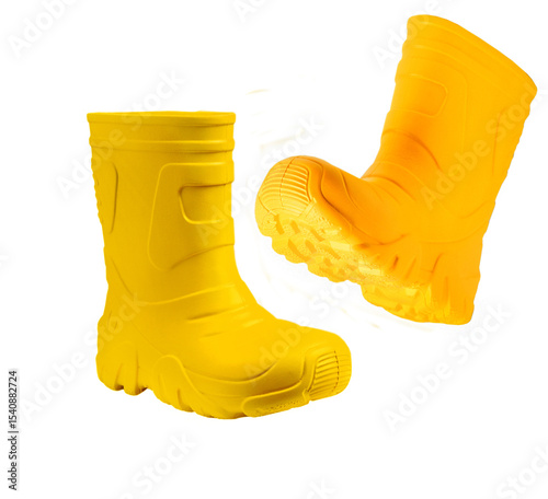 Walking yellow rain boots isolated on white background