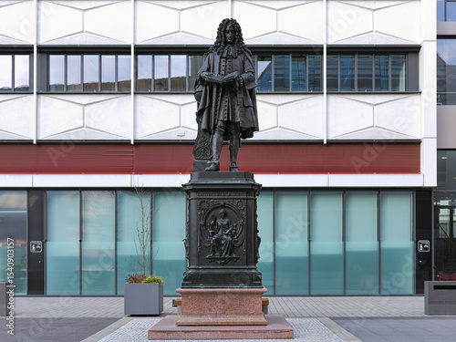 Leipzig, Germany. Leibniz Monument at new campus of University of Leipzig. The monument by sculptor Ernst Julius Hahnel was unveiled on October 25, 1883. Since 2008, it stand at the present location.