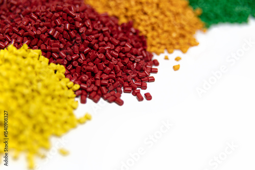 Colorful polymer granules on white background