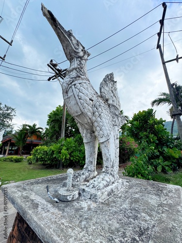 Hong Bird Statue in Phuket, Thailand with Broken Lantern Fixture