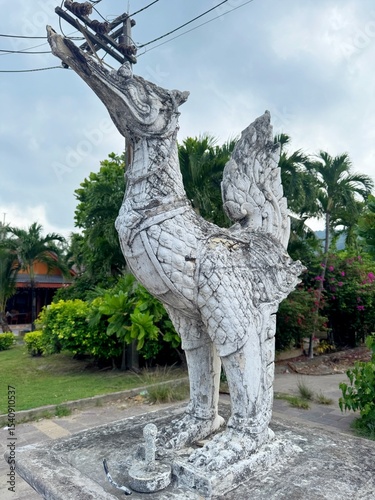 Hong Bird Statue in Phuket, Thailand with Broken Lantern Fixture