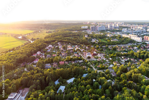 Bild auf Leinwand City outskirts turning into picturesque countryside, aerial view