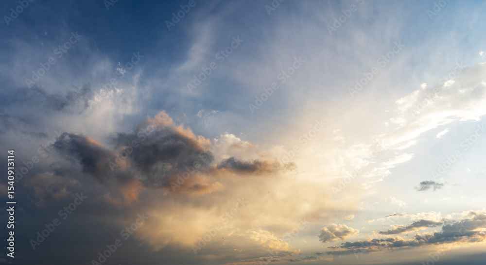Fototapeta premium Beautiful sunset sky, with clouds, after rain. Evening sky background.