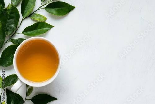 Sip of Warm Tea With Fresh Leaves on a Clean Surface in Natural Light During ...