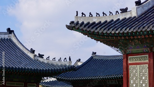 Closeup of a traditional Korean roof ridge design and ornamentation