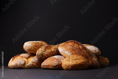 Freshly Baked Artisan Bread displayed on a dark background, highlighting its craftsmanship