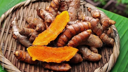 Fresh turmeric on background