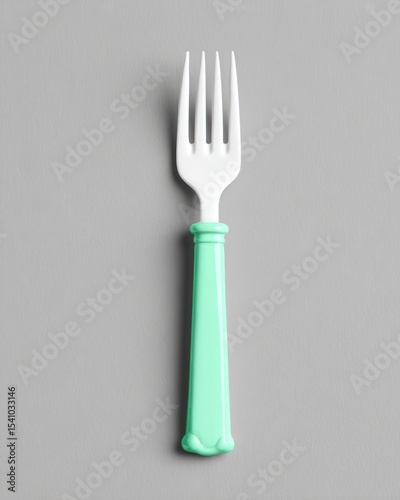 Mint Green Plastic Fork on Grey Background