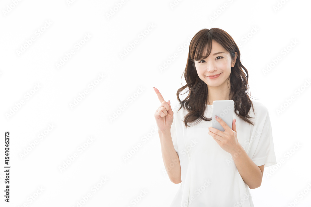 若い女性 スマートフォン 指差し
若い女性 スマートフォン 指差し