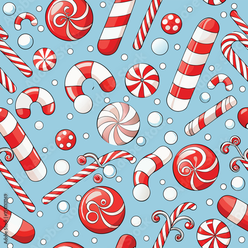 Festive Christmas Candy Pattern with Red and White Sweets on Blue Background