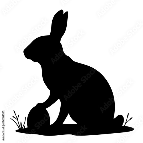 Silhouette of a rabbit hiding eggs in black and white, Easter symbol