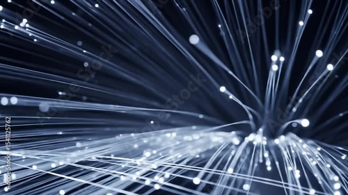 Fiber optic cables transmitting data, glowing light trails in a network communication concept video