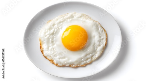 Fried egg on a white plate breakfast food