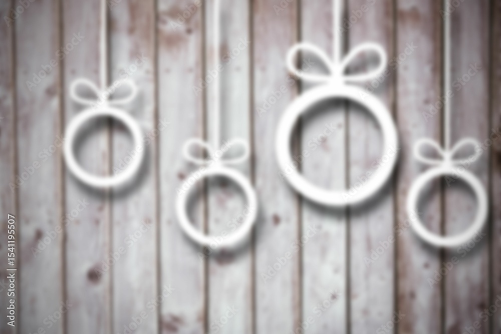 Obraz premium Blurred christmas decorations on wood