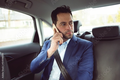 Businessman call in a car