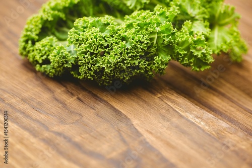 Close-up of parsley on wooden board
