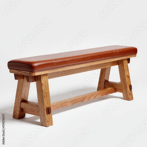 Solid wood bench with leather seat.  Simple,  functional design.  Classic,  craftsmanship