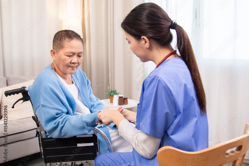 Fototapeta premium Young nurse and senior woman seated face to face, holding hands, engaging in compassionate conversation, showing attentive care and patient-centered communication at home, healthcare.