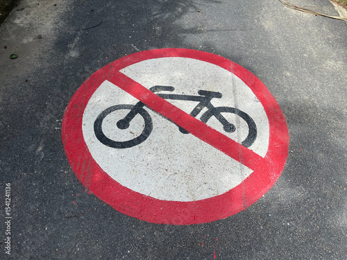 Bicycle sign on the road. No bike parking sign on the road.