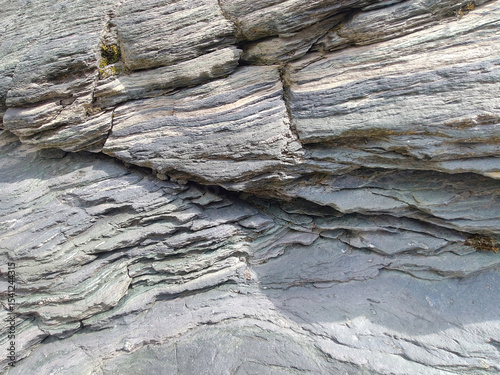 Stone background backdrop, mountain rock rough texture. Abstract grungy and textured surface of stone material