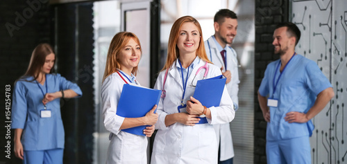 Female doctors in hall of clinic
