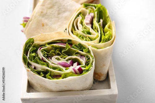 Plate of tasty lavash rolls...