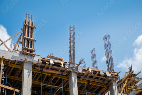 new building construction. concrete columns and iron rods. rebar. construction reinforcing bars.