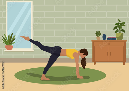 Young woman performing a leg raise exercise at home. Fitness routine and healthy lifestyle concept for body wellness.