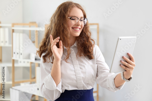 Young businesswoman working...