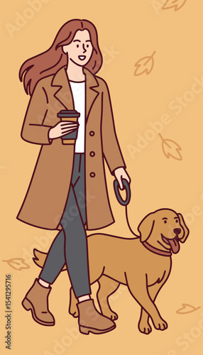 Young woman in stylish autumn coat walks her dog with coffee in hand on leaf-covered street enjoying peaceful seasonal moment
