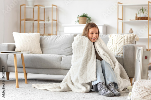 Young woman with warm blank...