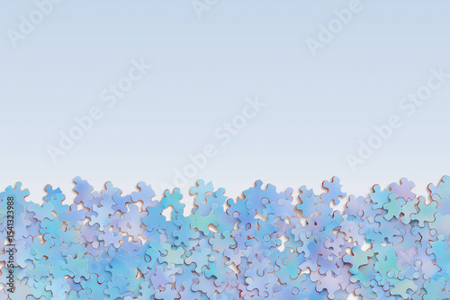 Scattered blue puzzle pieces create abstract pattern suggesting incomplete solutions awaiting assembly.