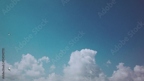 Turquoise Sky Time Lapse With White Clouds Slowly Drifting Across the Bright Blue Sky Motion Cloudscape