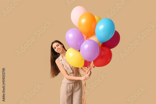 Happy young woman with colo...